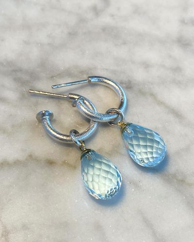 Sølv creoler med gull og blå topasdråper